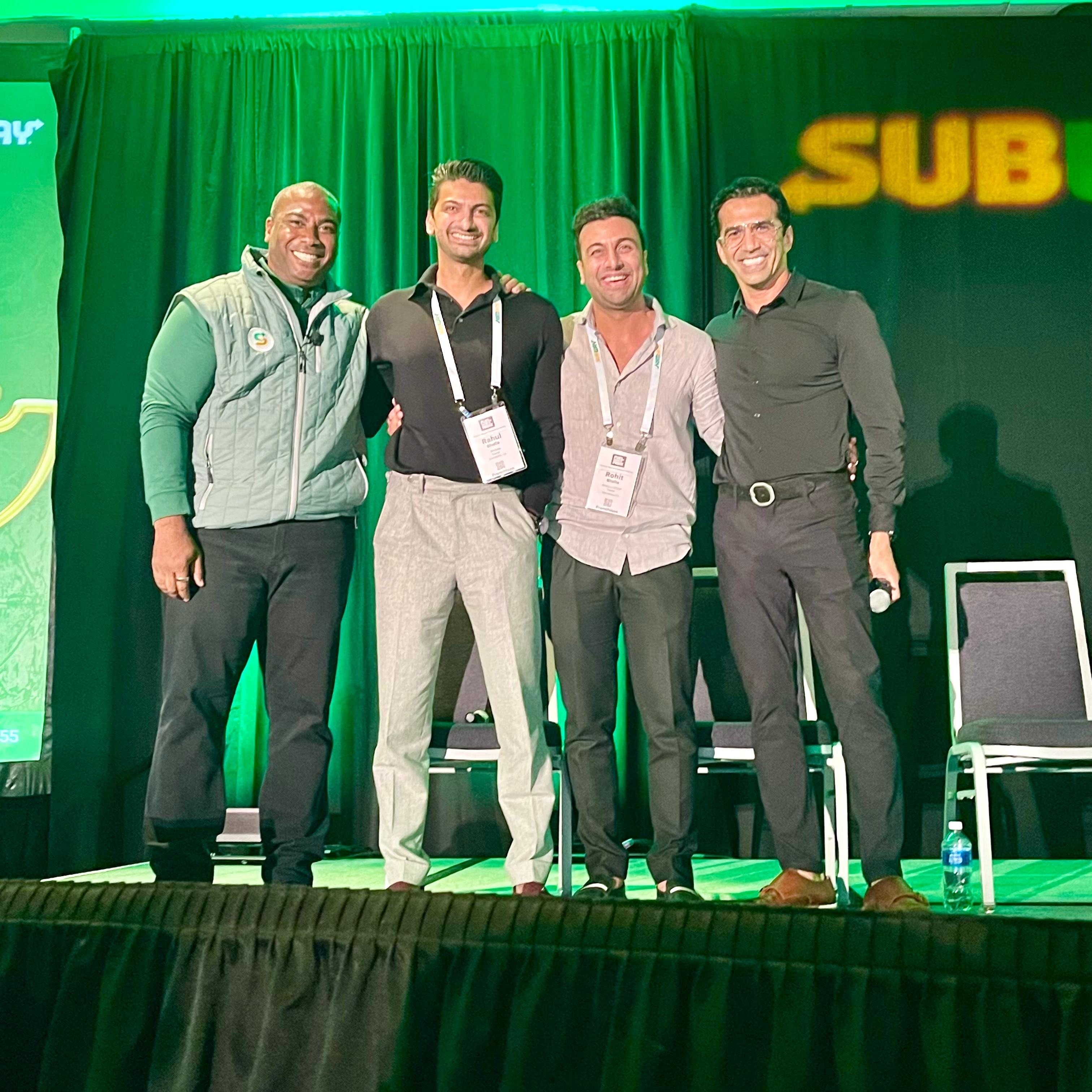 Rahul and Rohit Bhalla on stage at Subway convention
