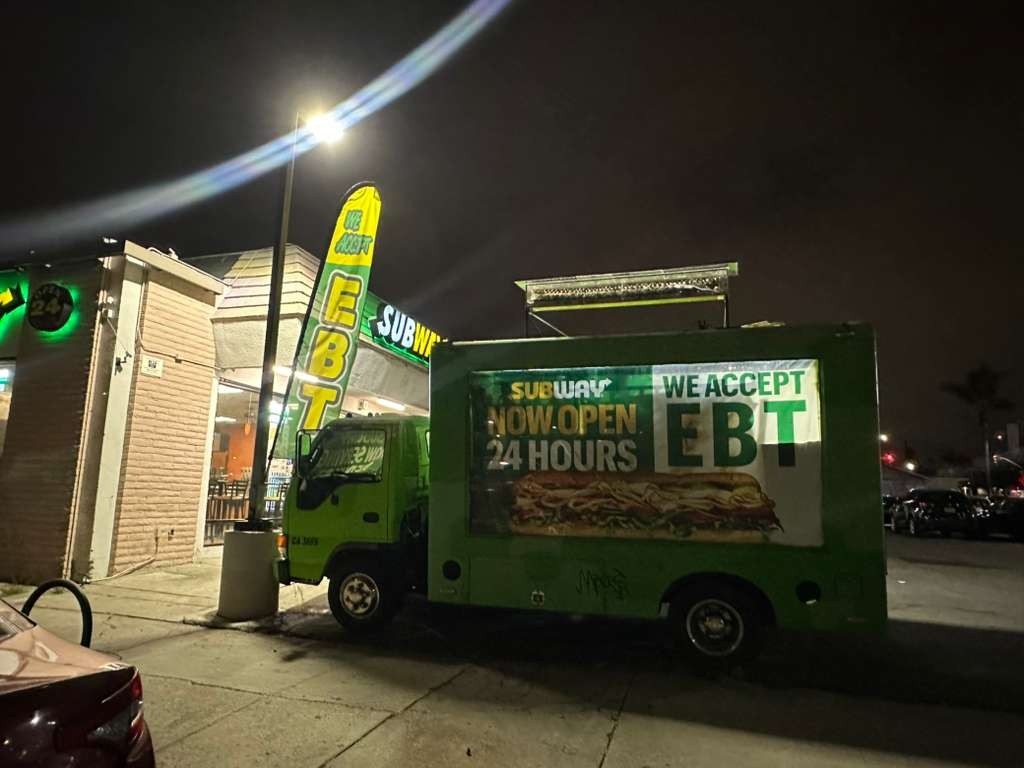 Subway marketing truck at night